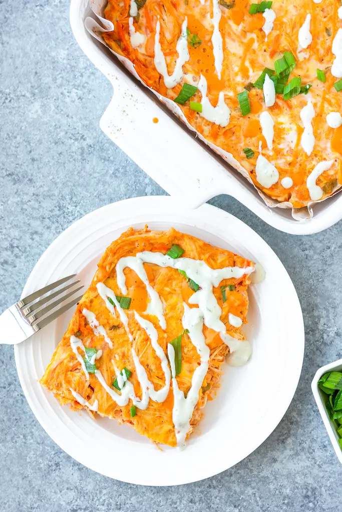 buffalo chicken casserole drizzled with ranch
